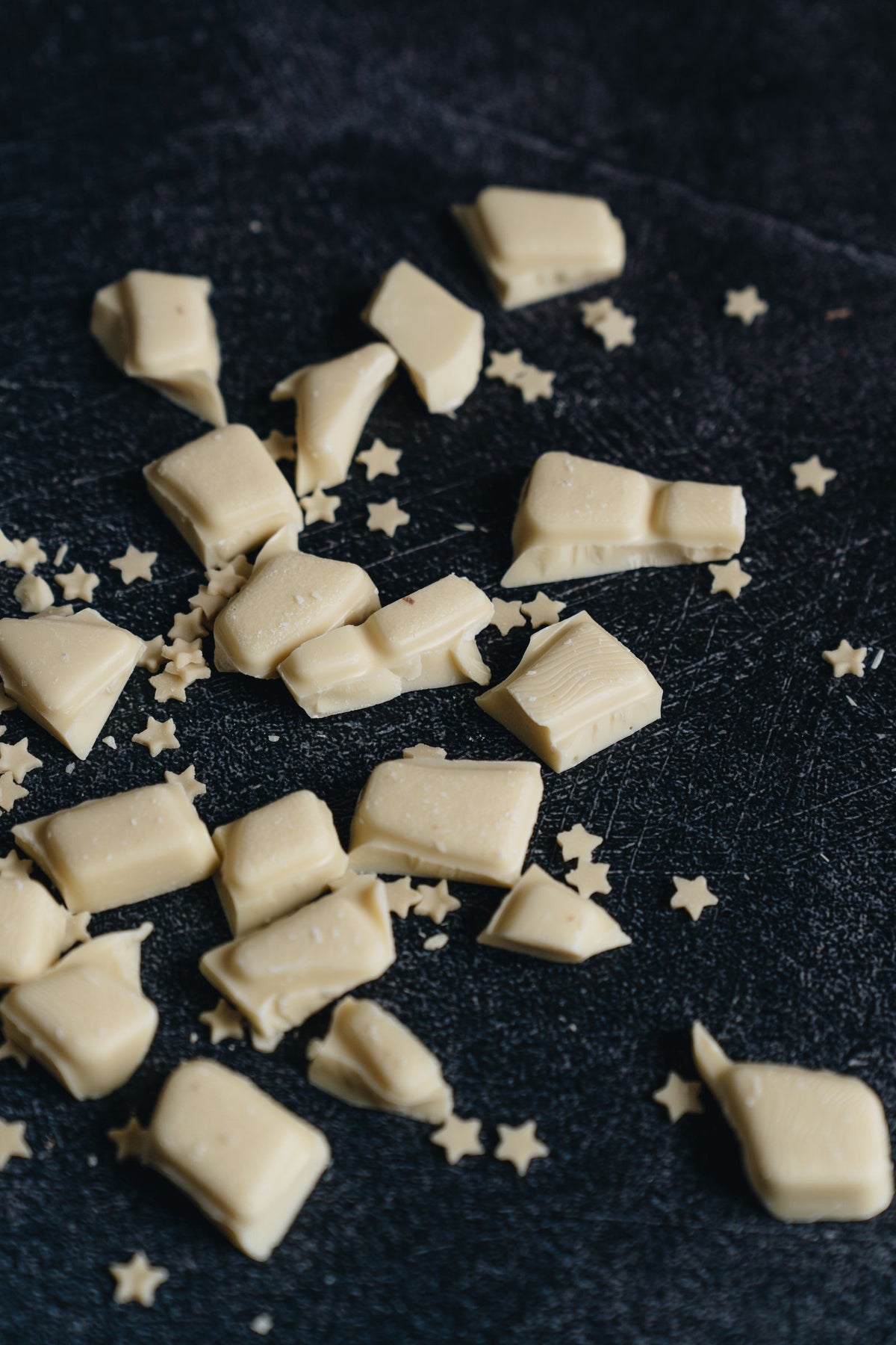 White chocolate pieces illustrating chocolate bloom